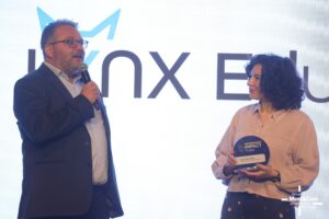 Sylvie Milverton, Lynx Educate CEO receiving the award
